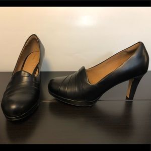 Brand new Black leather Clark high heels.